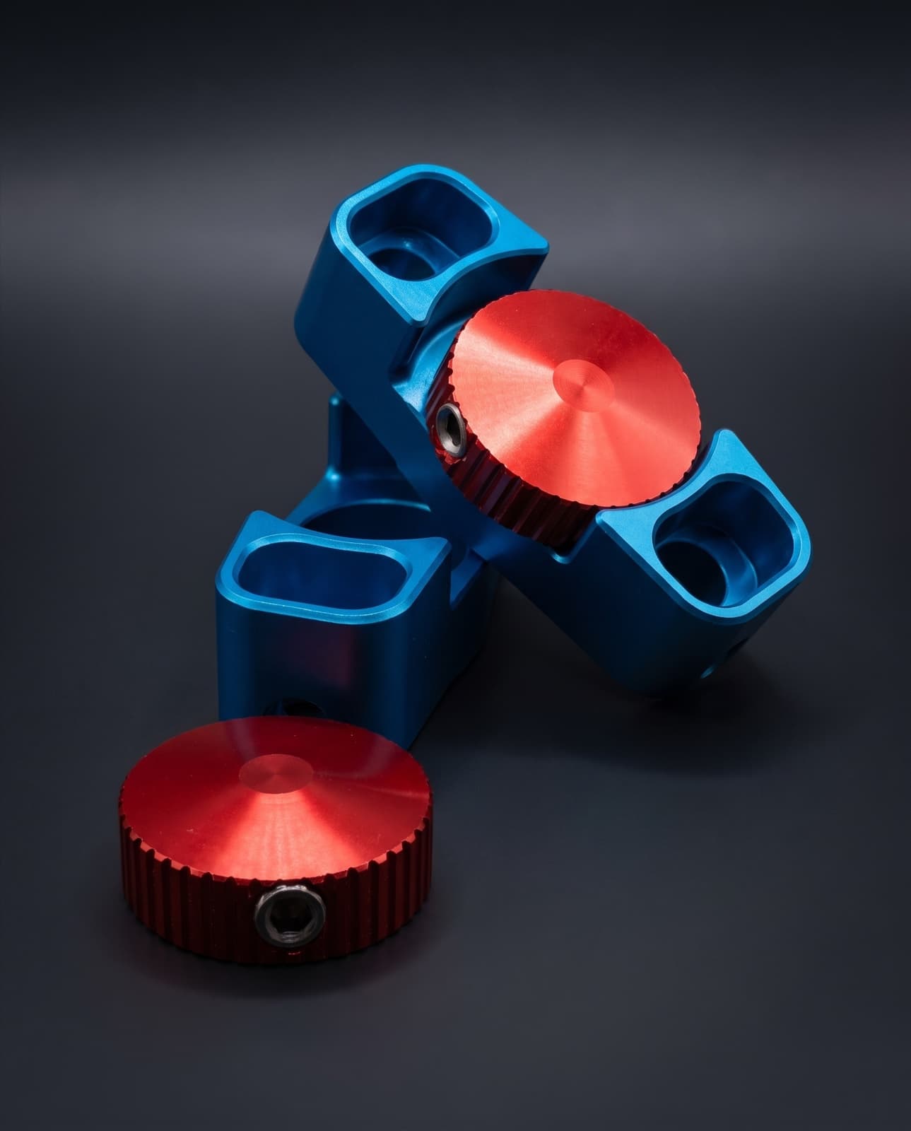 Complete WP fork adjuster set — blue anodised bodies with red knurled adjuster knobs